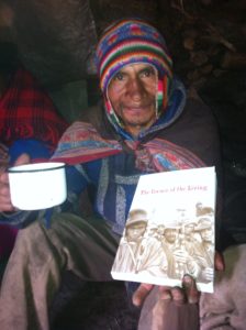 Narciso Huamán with the book, "The Corner of the Living." Narciso Huamán with the book, "The Corner of the Living."